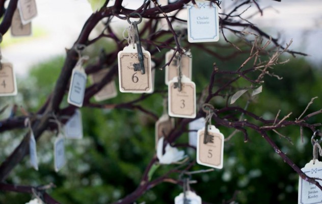Vintage key escort cards on branches