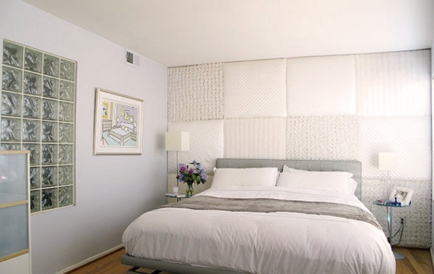 Fabric panels behind the bed